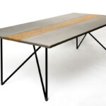 Dining room table, hand crafted from wood concrete and steel.