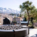 Modern industrial design, concrete and steel firepit overlooking Steamboat springs CO