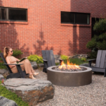 A 4' round firetable creates the gathering point in this serene Denver courtyard that was designed by Marpa Landscapes.